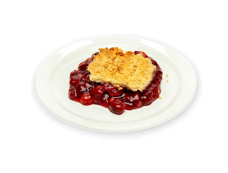 Warm homemade fruit cobbler with premium IQF fruit and a buttery crumble on a white plate.