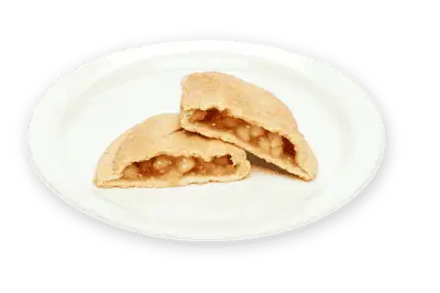 Golden flaky crust hand pie with real IQF fruit filling, perfectly sliced on a white plate for easy grab.