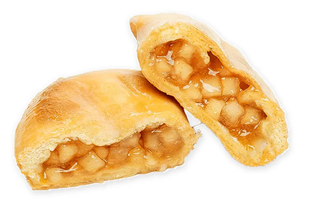 Cut apple hand pie with golden crust, showcasing juicy filling. Ideal for bakeries, delis, and foodservice.