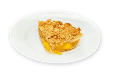Peach pie slice with golden crust made from premium IQF fruit. Enjoy homemade flavor fast with no prep required.